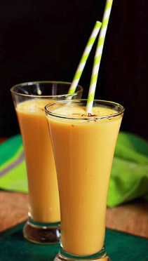 Two glasses of mango lassi